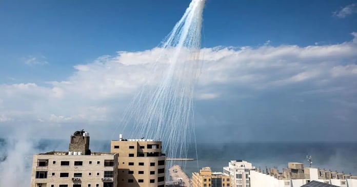 Airbursts of artillery-fired white phosphorus fall over the Gaza
