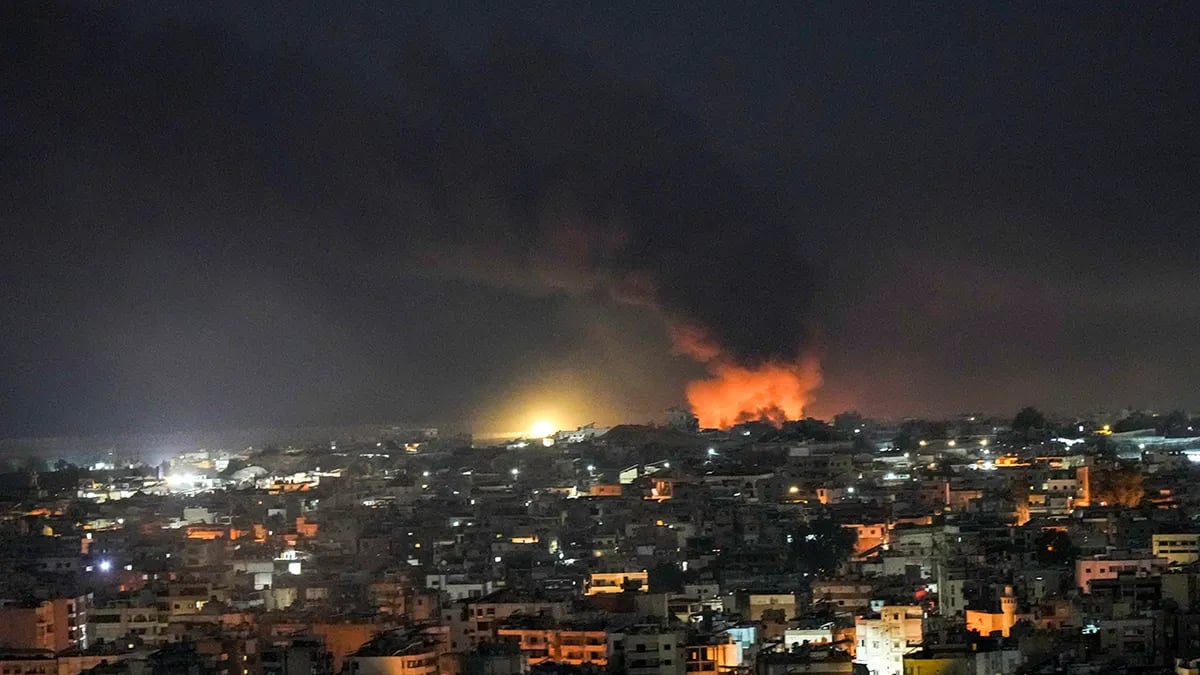 Flames and smoke rise from an Israeli airstrike