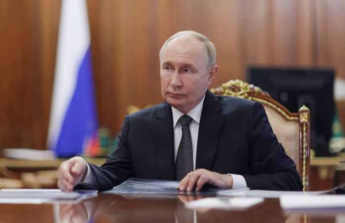 Russian President Vladimir Putin meets head of the North Ossetia–Alania region Sergei Menyailo