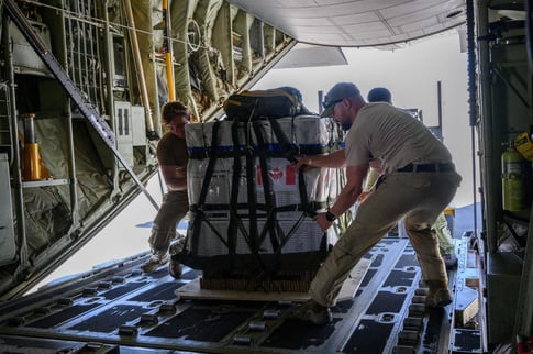 Canadian hercules aircraft, Gaza aid airdrop, pallets loading, jordan airport, humanitarian mission