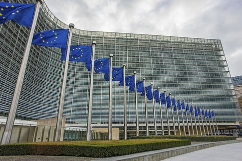 european commission building with eu flags, brussels
