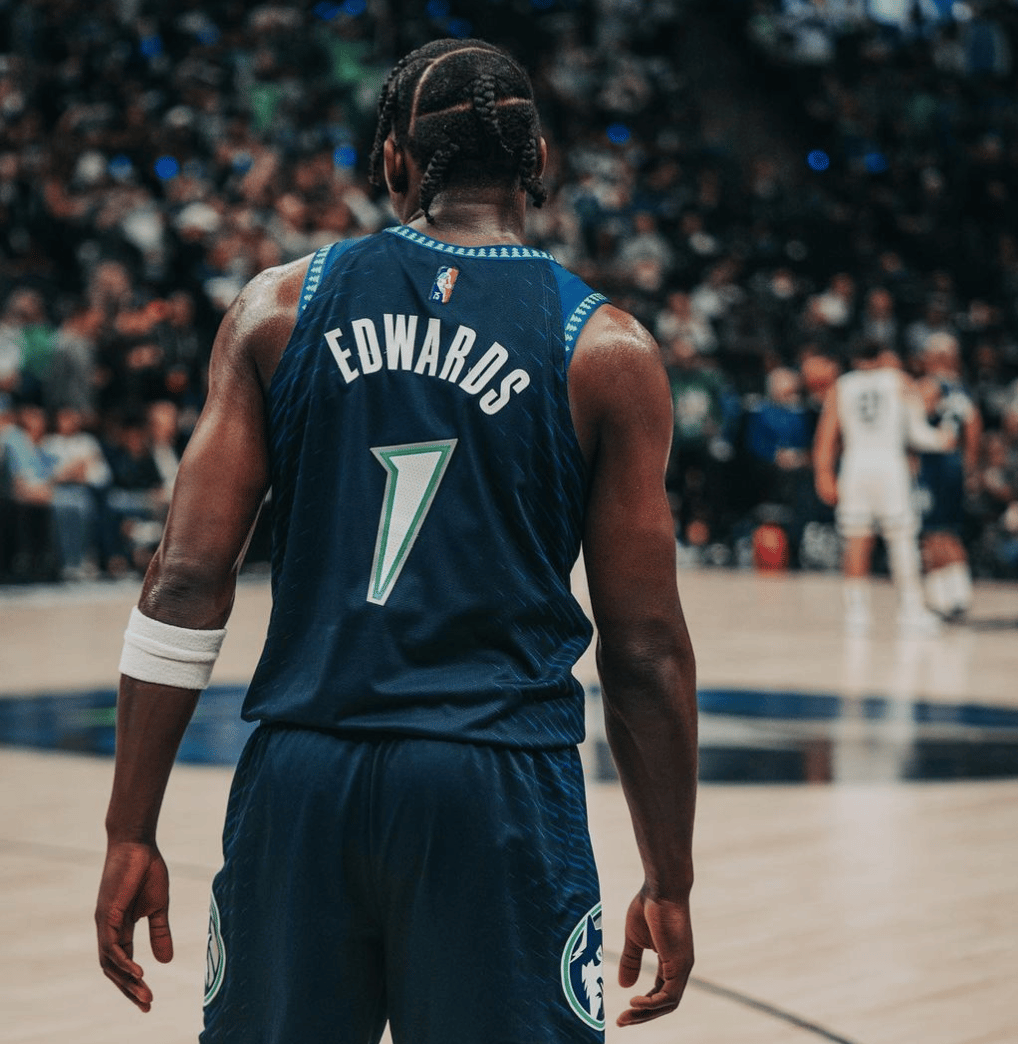 Back of Anthony Edwards’ Timberwolves Black Trees jersey showing nameplate, number, and waistband trim.