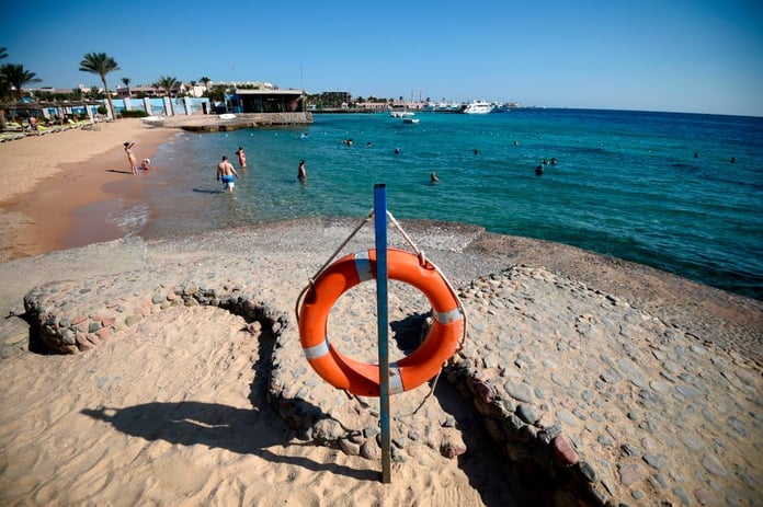 Egypt shark attack, Red Sea closures, Hurghada safety, Marsa Alam, Sharm el Sheikh, beach flag