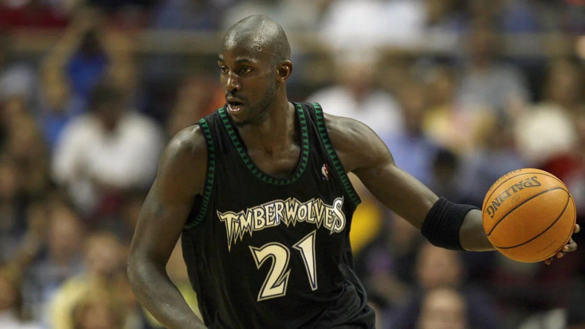 Kevin Garnett in the original Minnesota Timberwolves black trees uniform during the 2003–04 season.