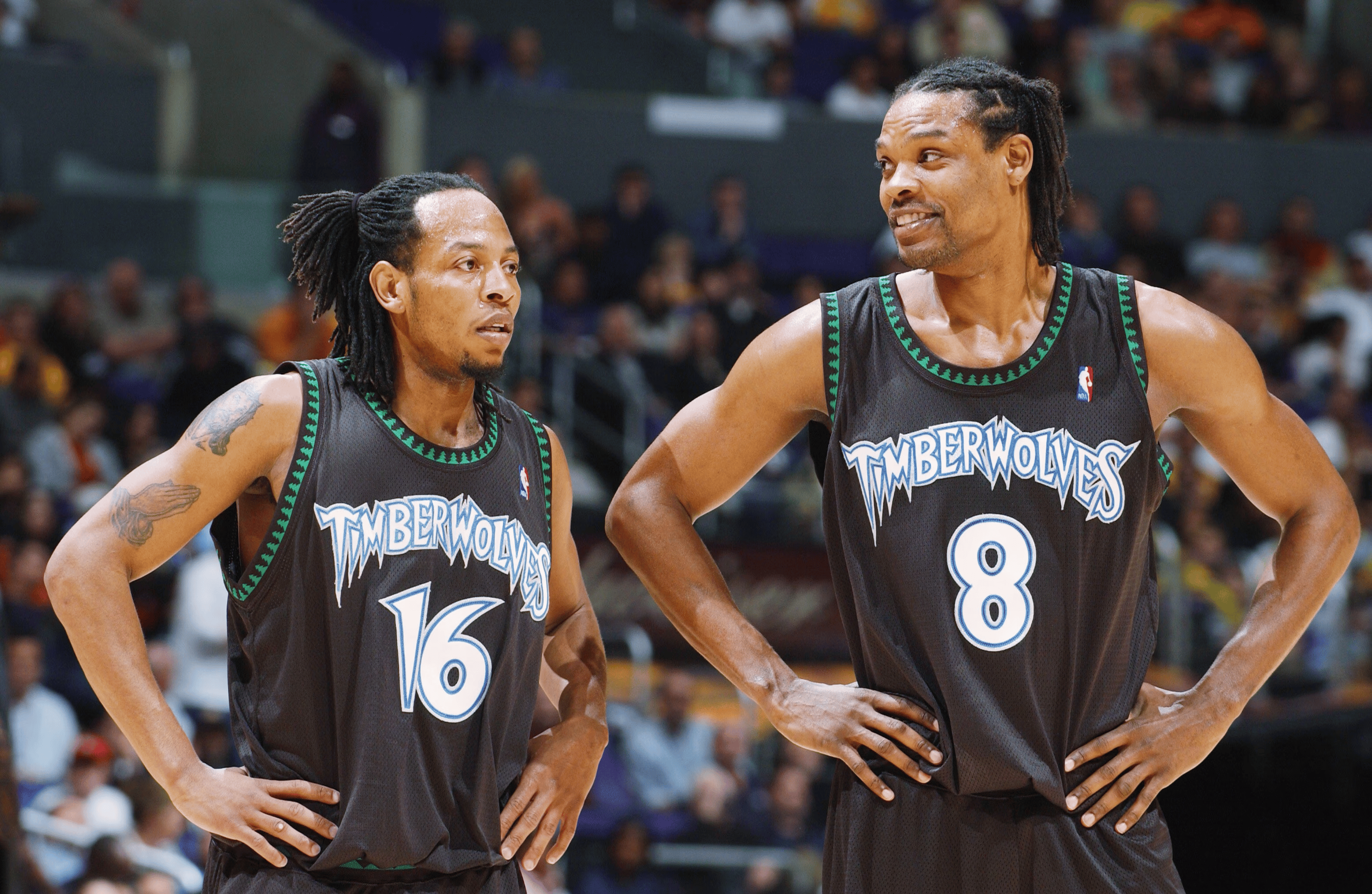 Fans at Target Center wearing throwback Minnesota Timberwolves Black Trees jerseys on Classic Edition night.