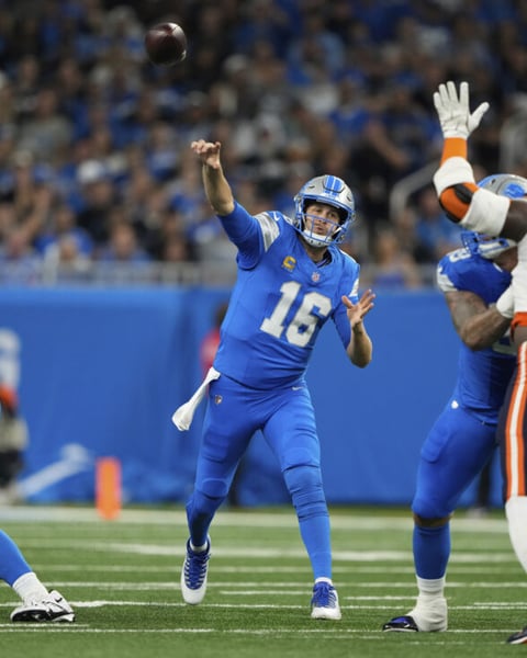 Jared Goff throwing a touchdown pass against the Chicago Bears at Ford Field in 2025 NFL Week 2 game