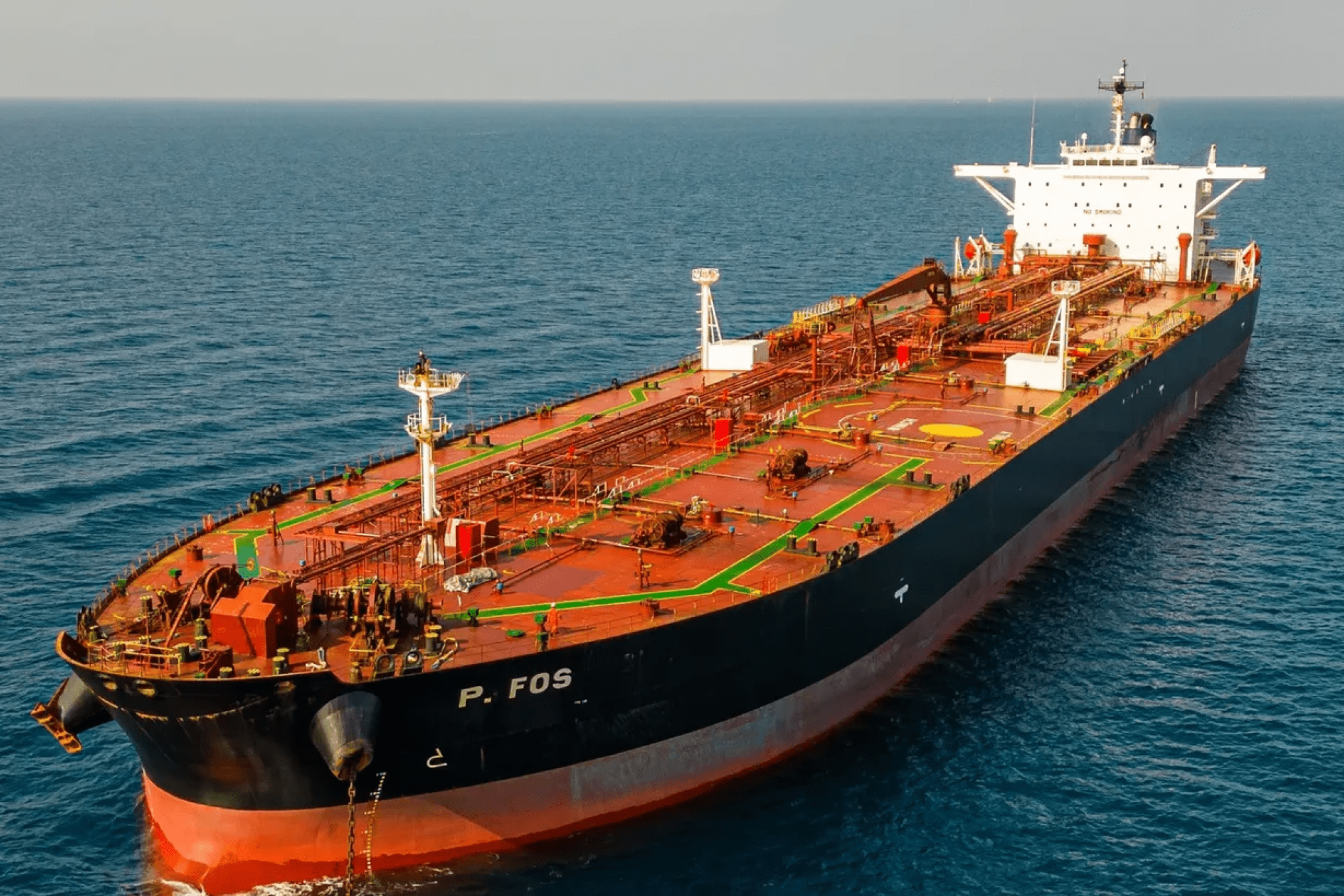 Estonian Navy vessel alongside a detained oil tanker in the Baltic Sea