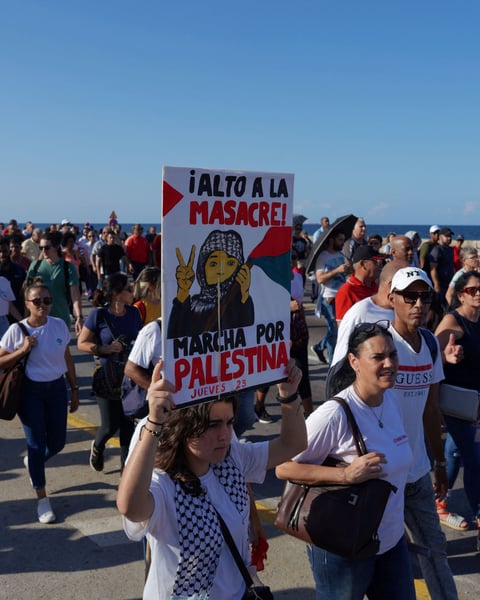 Cubans wave Palestinian flags outside the U.S. Embassy on Havana’s Malecón, Oct. 9, 2025.