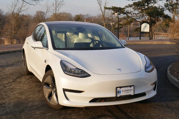 Model 3 delivery checklist on screen during end-of-quarter handover
