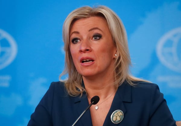 Maria Zakharova delivering prepared remarks at a Foreign Ministry press briefing