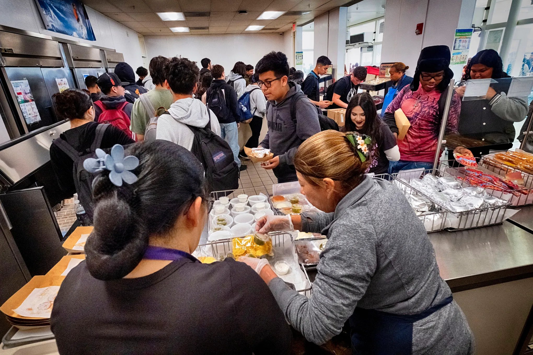 Fast-food employees serving customers in California