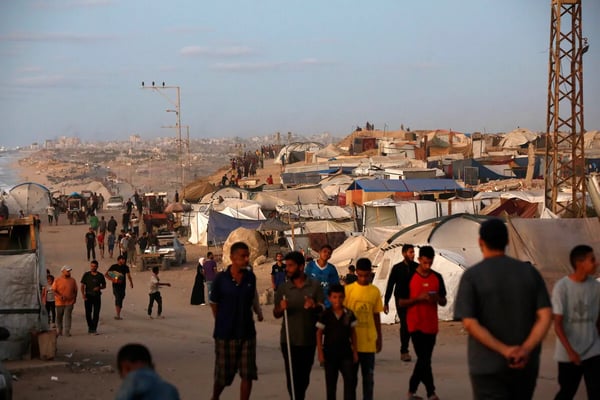 Gaza mourners and Sudanese refugees reflect deepening Middle East crisis on Day 698
