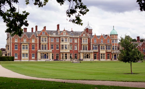 Sandringham House estate exterior showing Victorian Jacobean architecture and landscaped grounds