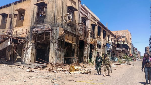 Armed Rapid Support Forces fighters patrolling streets of El-Fasher amid Sudan civil war 2025