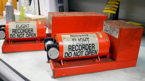 Orange flight data recorder black box used in aviation crash investigations