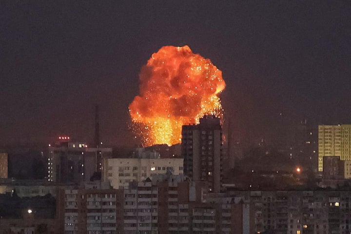 Missile strike aftermath in Kyiv with damaged buildings and smoke rising