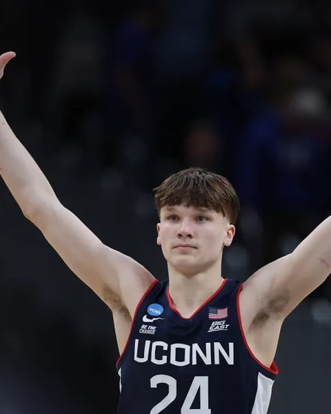 UConn freshman Braylon Mullins celebrates after his 35-foot buzzer-beater against Duke in the 2026 NCAA Tournament Elite Eight