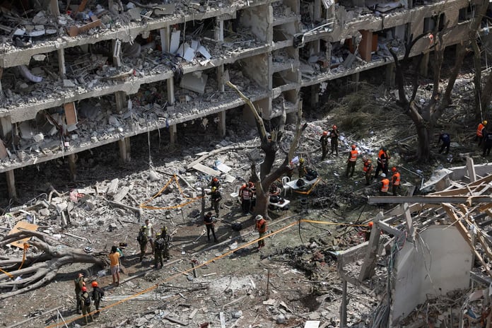 Israel missile damage in Tel Aviv after Iran retaliation during Israel attacks Iran war