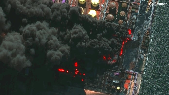 Ukrainian drone strike hits Russia Ust-Luga oil port with smoke rising from storage tanks