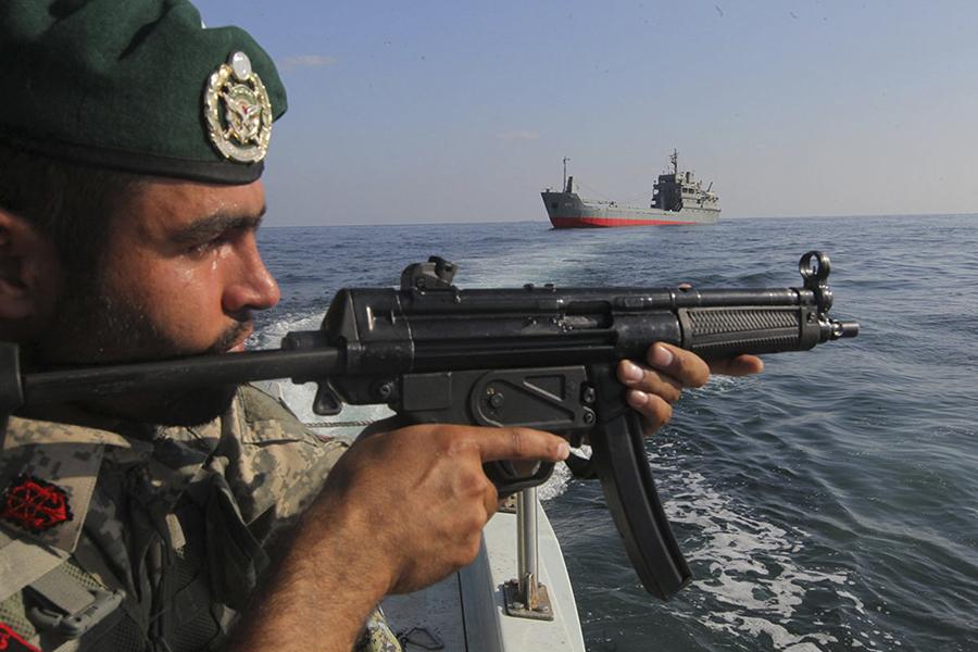 IRGC naval vessels patrolling the Strait of Hormuz enforcing restrictions