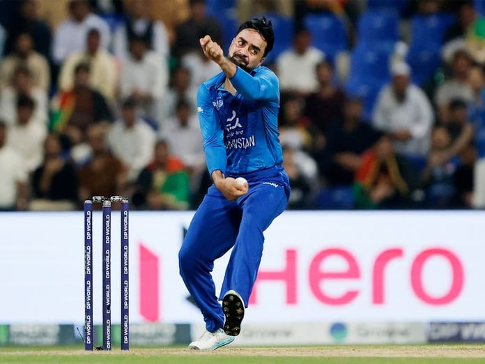 Rashid Khan bowling during Test match amid injury concerns