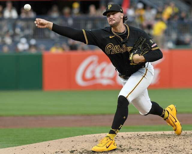 Paul Skenes throws a fastball against the Colorado Rockies