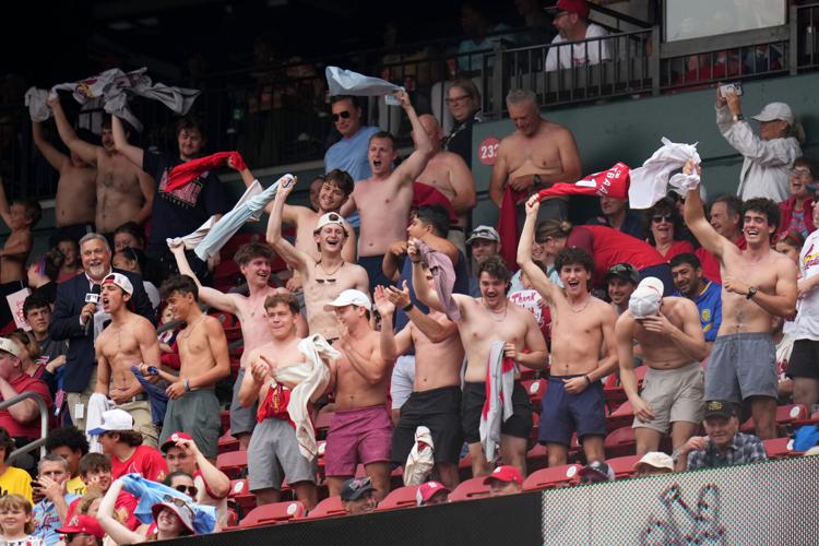 Shirtless Cardinals fans creating “tarps off” section energy during Royals game