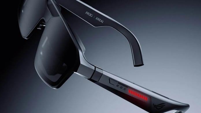 ASUS ROG XREAL R1 AR gaming glasses with handheld gaming setup