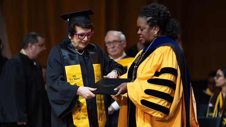 Billie Jean King Crossing Graduation Stage Billie Jean King walks across graduation stage during Cal State LA commencement ceremony
