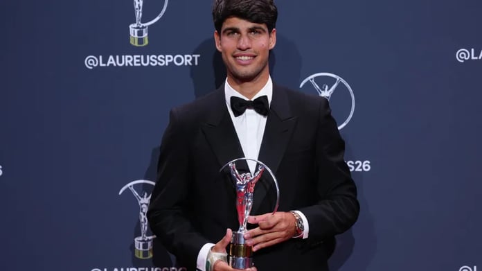 Carlos Alcaraz reacts during a match after wrist injury forces Wimbledon withdrawal in 2026
