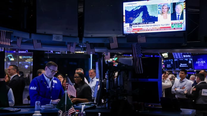 Wall Street traders react as oil prices surge and AI semiconductor stocks rally amid Iran tensions