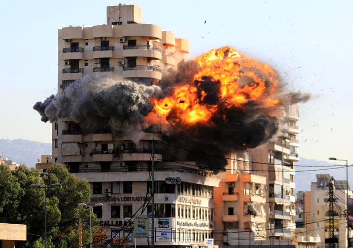 Smoke rises over Beirut suburbs after Israeli airstrikes as Lebanon death toll surpasses 3100
