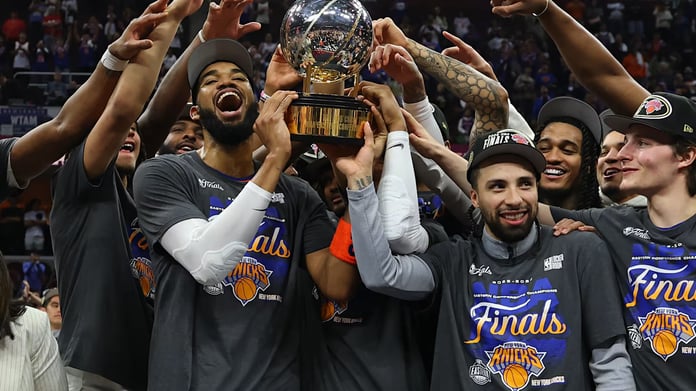 New York Knicks players celebrating on court after sweeping Cavaliers to reach NBA Finals 2026