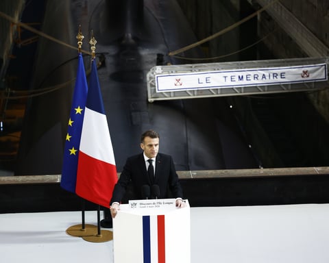 French President Emmanuel Macron delivers his forward deterrence speech beside the nuclear submarine Le Temeraire at the Ile Longue naval base in Brittany France on March 2 2026
