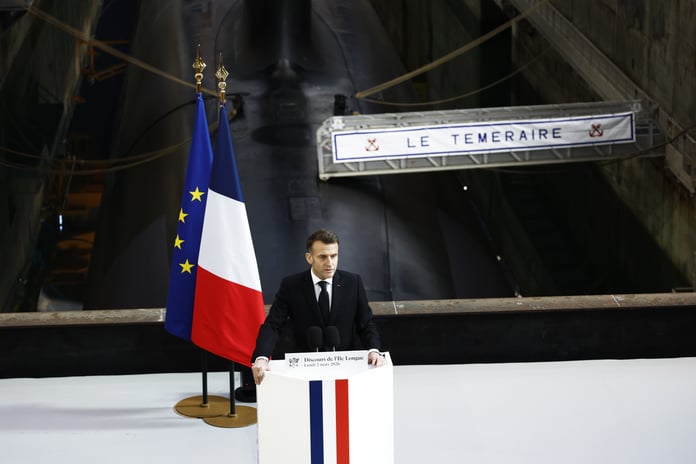 French President Emmanuel Macron delivers his forward deterrence speech beside the nuclear submarine Le Temeraire at the Ile Longue naval base in Brittany France on March 2 2026