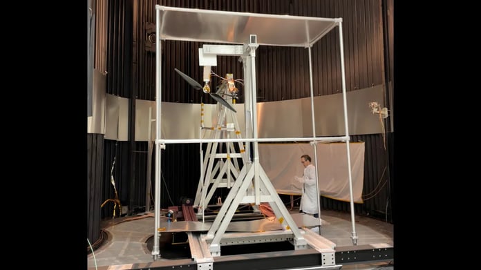 NASA Mars helicopter rotor blade undergoing Mach 1 supersonic testing inside a simulated Martian atmosphere chamber