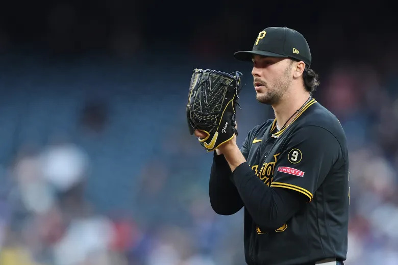 Paul Skenes throws a fastball against the Colorado Rockies