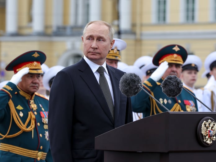 Russian President Vladimir Putin speaks about accelerating weapons production and defense manufacturing in Moscow