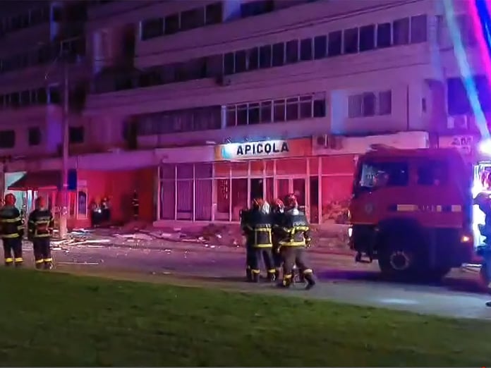 First responders at a Galati apartment block hit by a Russian drone in Romania