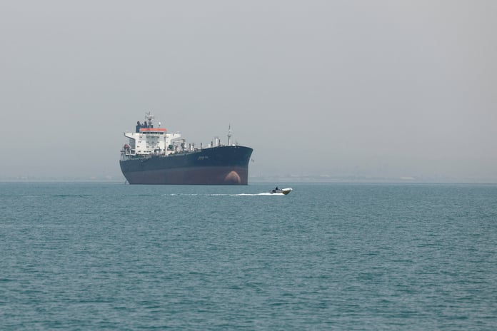 Vessels sail in the Strait of Hormuz off Iran as Trump describes US-Iran war negotiations as advancing
