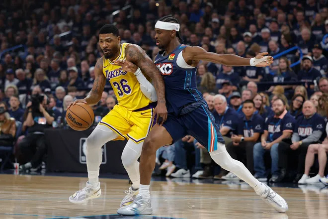 Shai Gilgeous-Alexander celebrates as LeBron James reacts during Thunder vs Lakers Game 3