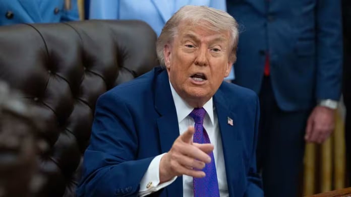 US President Donald Trump and UN headquarters amid migration sovereignty dispute