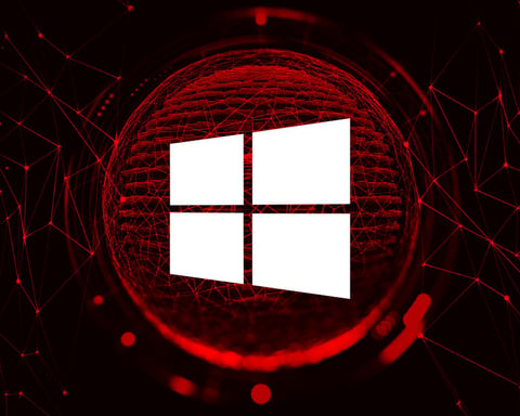 Windows 11 system under cyberattack showing zero-day exploit warning and system compromise