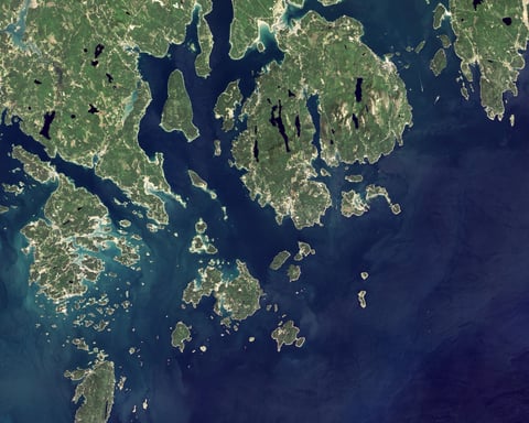 NASA Landsat satellite view of Acadia National Park in Maine, where climate-change signage was removed under a Trump executive order and ordered restored