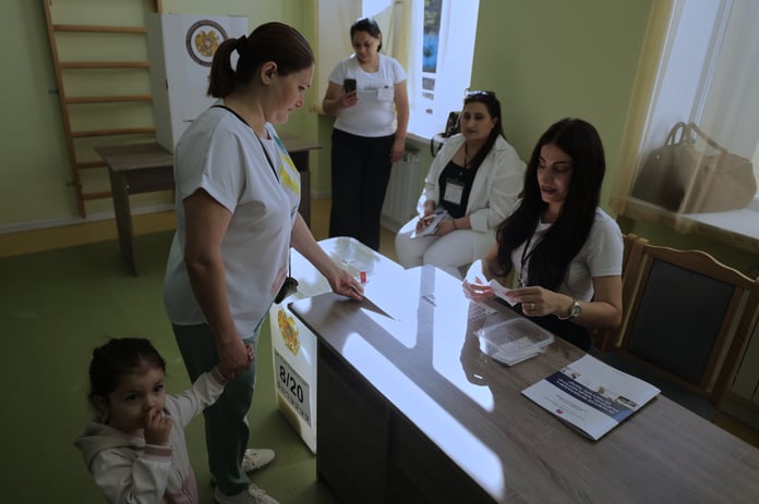 Armenian voters cast ballots at a polling station during the June 7 2026 parliamentary elections in Yerevan