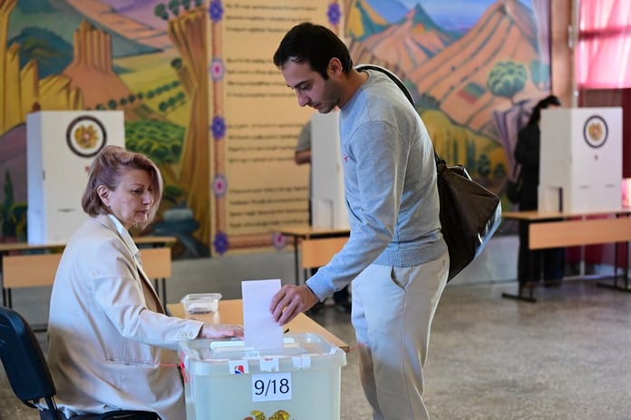 Armenians vote at a polling station in Yerevan during the June 7 2026 parliamentary election