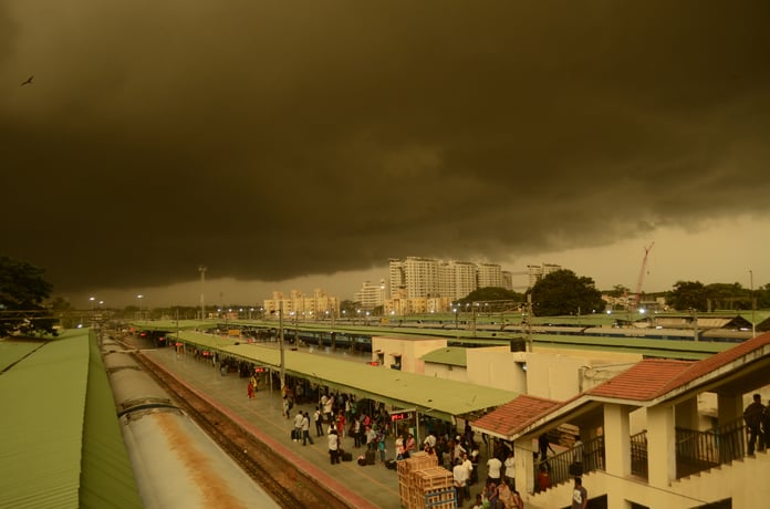 Dark monsoon rain clouds gathering over Bengaluru City railway station as the IMD issues a red alert