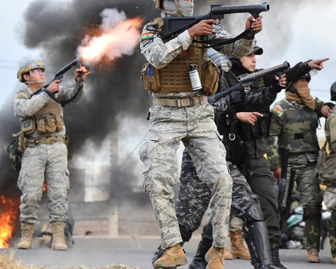 Police fire tear gas at anti-government protesters blocking a highway in Vinto Bolivia June 8 2026
