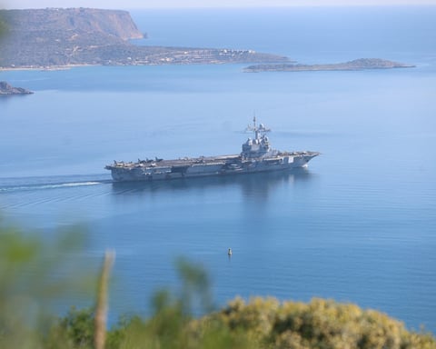 French nuclear aircraft carrier Charles de Gaulle at Souda Bay Crete Greece April 2026 before Arabian Sea Hormuz mission