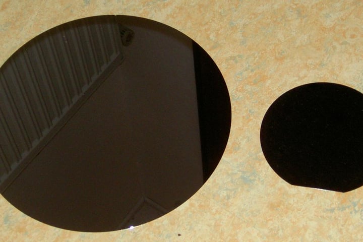 Polished semiconductor wafers, illustrating the China-Infineon gallium nitride chip patent ruling